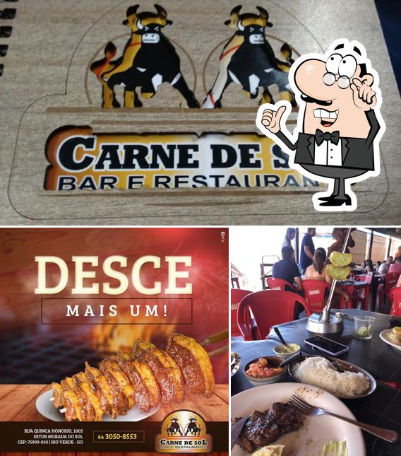 Sente em uma das mesas no Carne de Sol - Bar e Restaurante