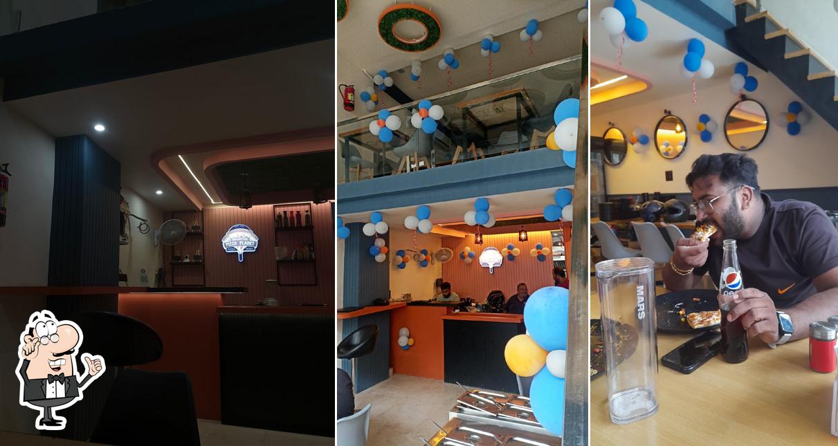 The interior of Unlimited Pizza Planet - Best Pizza in Kota