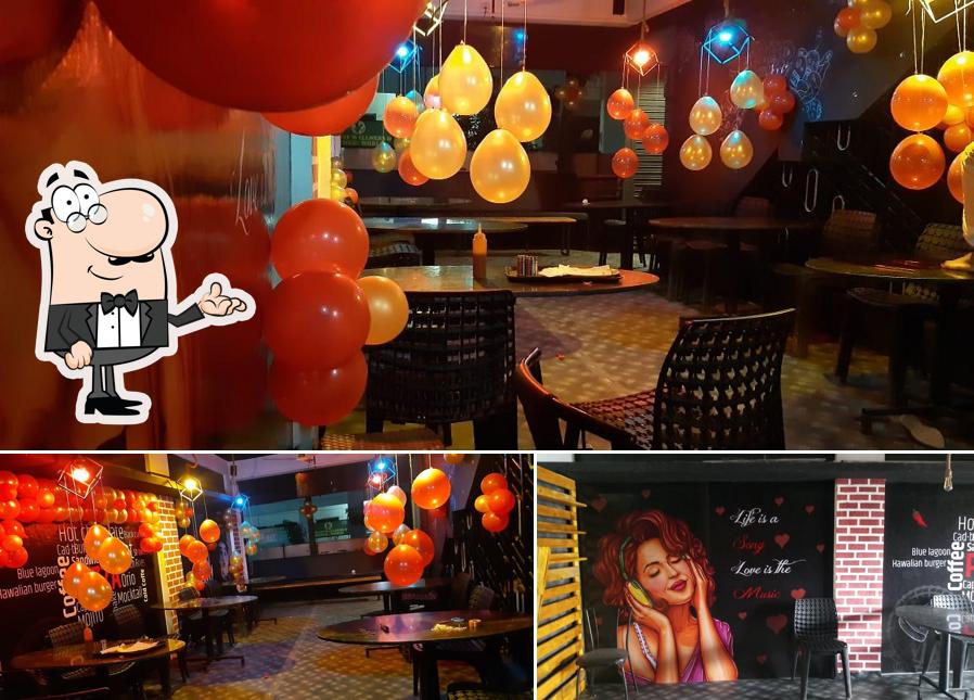 Take a seat at one of the tables at The Carnival Pizza