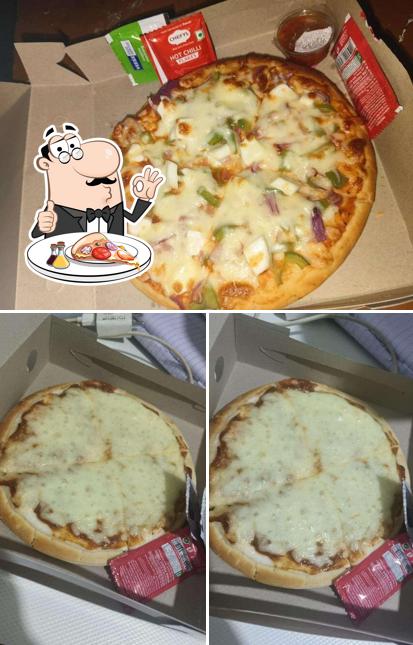 Try out pizza at Purnima's Snacks And Food