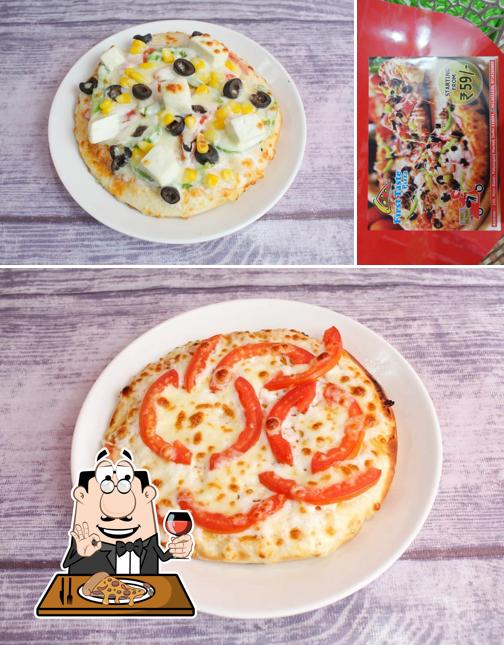 Get pizza at First Taste