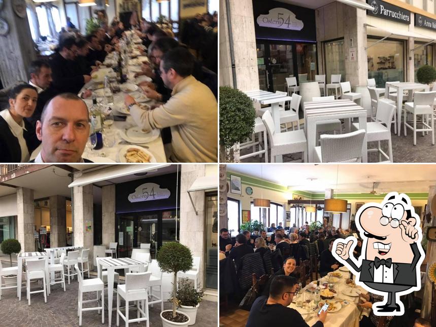 Dai un'occhiata agli interni di Osteria 54