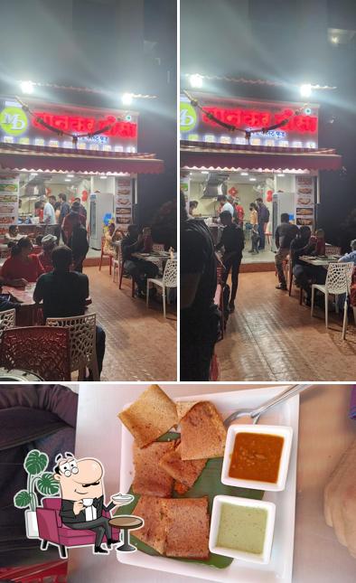 Mankar Dosa And Snack Centre. is distinguished by interior and food