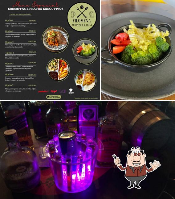 Dê uma olhada a foto apresentando comida e balcão de bar a Emporio Filomena