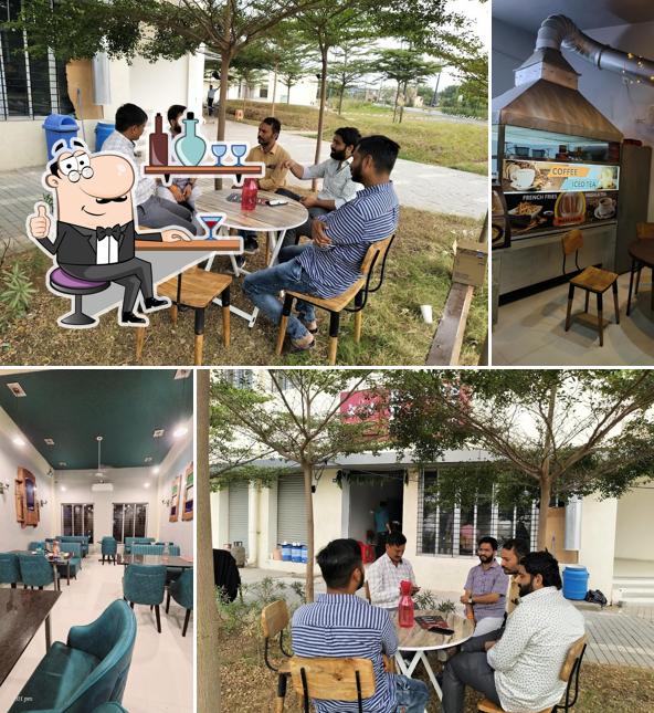 Take a seat at one of the tables at Rajvee Food Fort