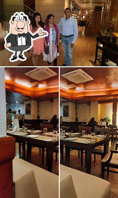 Take a seat at one of the tables at Prez Restaurant