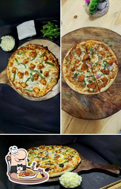 Get pizza at Lip Lick Cafe