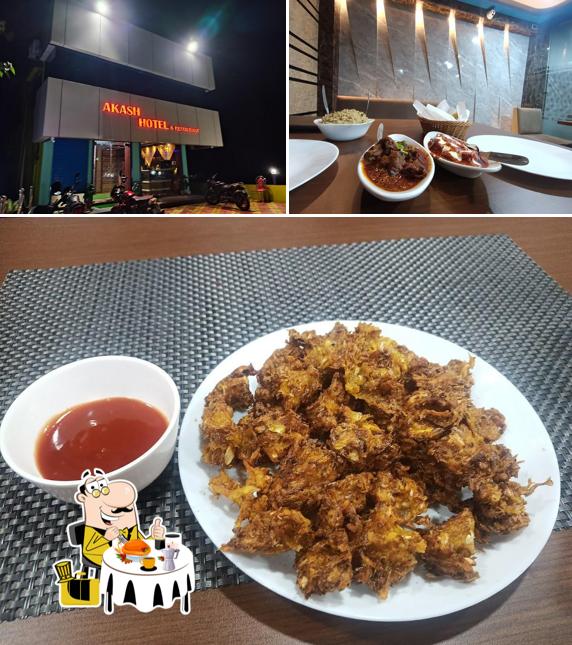 Among various things one can find food and exterior at Akash Hotel & Restaurant