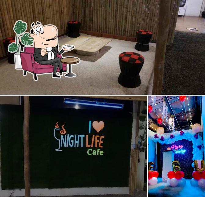 Take a seat at one of the tables at NIGHT LIFE CAFE