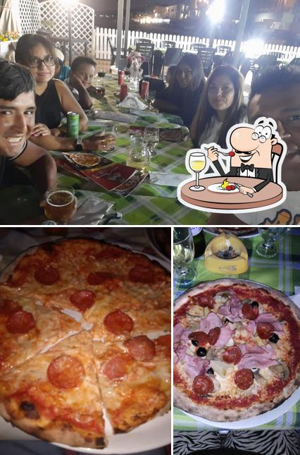 Tra le diverse cose da Da Roberto si possono trovare la cibo e interni