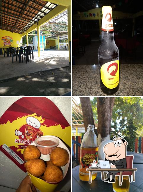 O interior do PIZZARIA & CIA