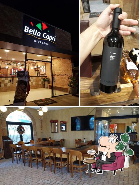 Sente em uma das mesas no Bella Capri Pizzaria - Barretos