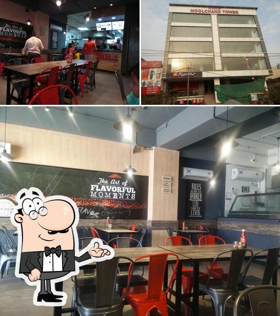 Pizza Hut Mahavir Enclave, Delhi is distinguished by interior and exterior