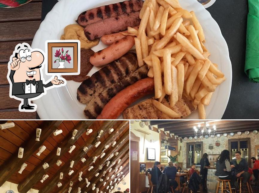 Questa è la foto che presenta la interni e cibo di Birreria Monti D'Oro
