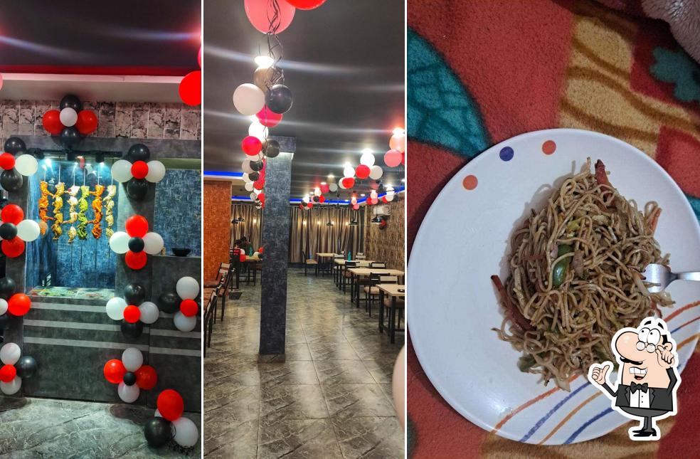 Take a seat at one of the tables at TASTE OF KOLKATA PREMIUM