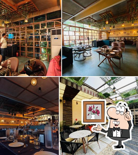 Take a seat at one of the tables at Bootleggers Restaurant in Vaishali Nagar