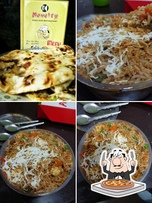 Get pizza at Novelty Veg Restaurant