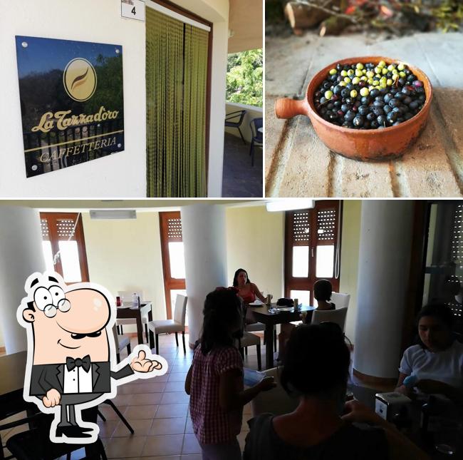 Questa è la foto che presenta la interni e cibo di Su Nuraxi Agriturismo-Hotel