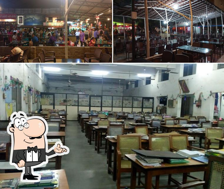 Take a seat at one of the tables at Vishnuji Ki Rasoi