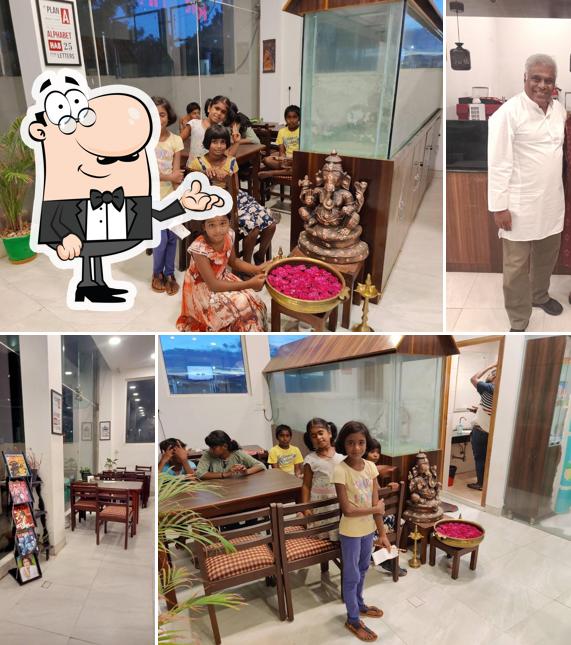 Take a seat at one of the tables at Karbonn Cafe