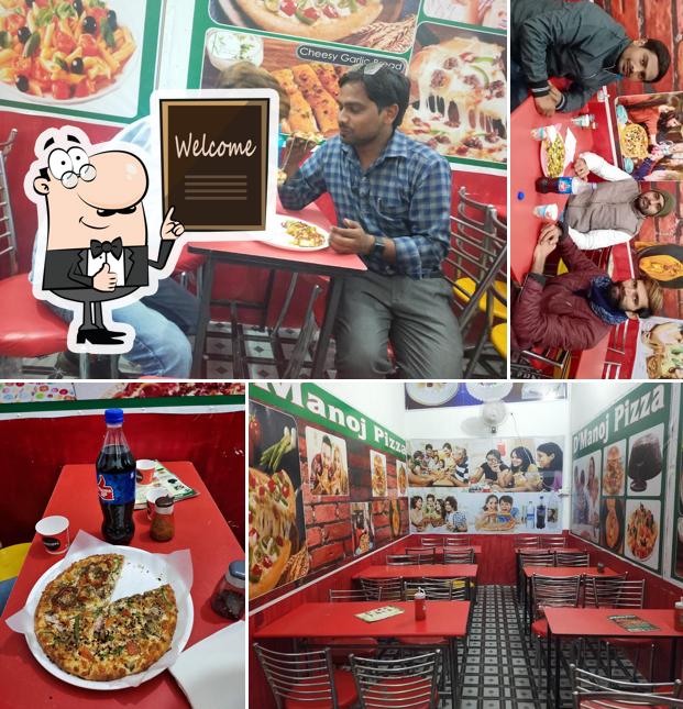 Look at the image of D'Manoj Pizza