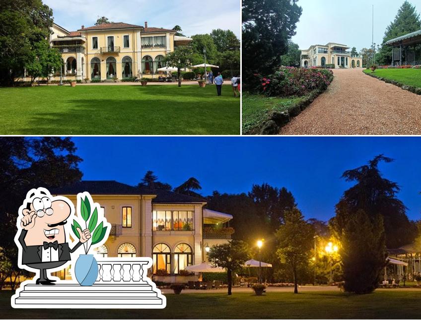 Puoi goderti l'aria fresca da seduto all'esterno di Villa Mattioli