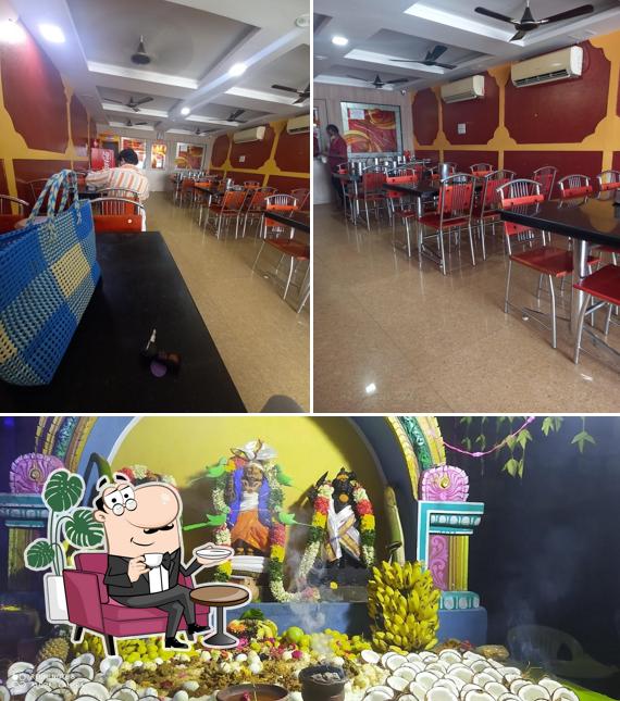 This is the picture showing interior and food at Hotel Famous Biryani