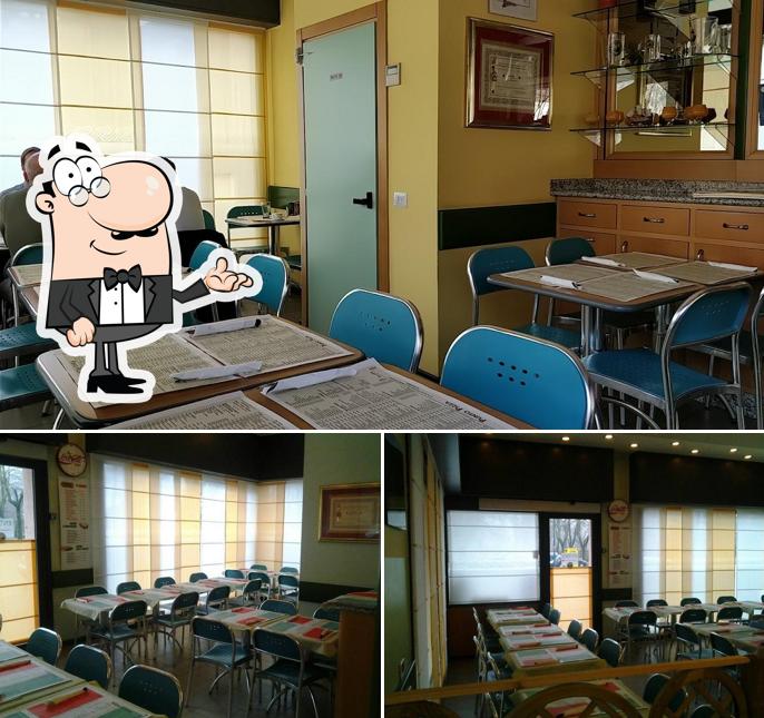 Dai un'occhiata agli interni di Punto Pizza
