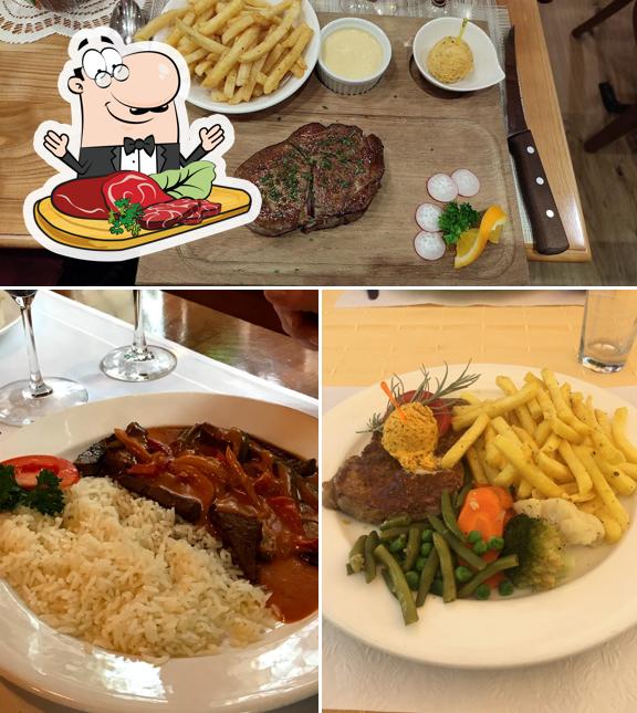 Prenditi i piatti di carne a Wirtschaft zum Löwen