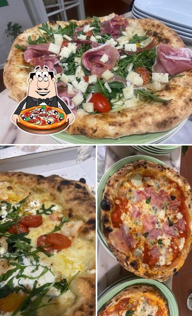 Prenditi una pizza a Damè Restaurant