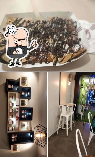 The photo of interior and food at 99 Pancakes