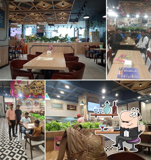 Take a seat at one of the tables at Haldiram's