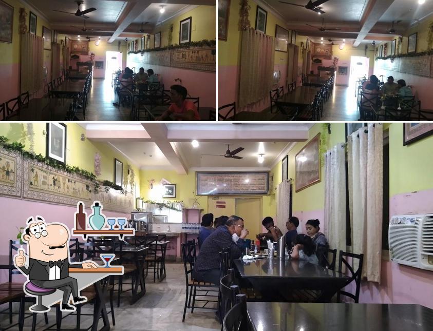 Take a seat at one of the tables at Harry's Cafe