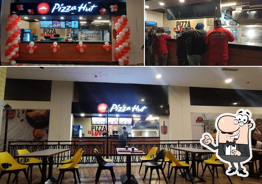 The interior of Pizza Hut NCS Square Mall Adabari, Guwahati