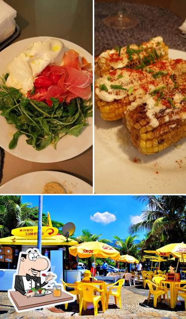 A imagem da comida e interior a Quiosque Oka Vista