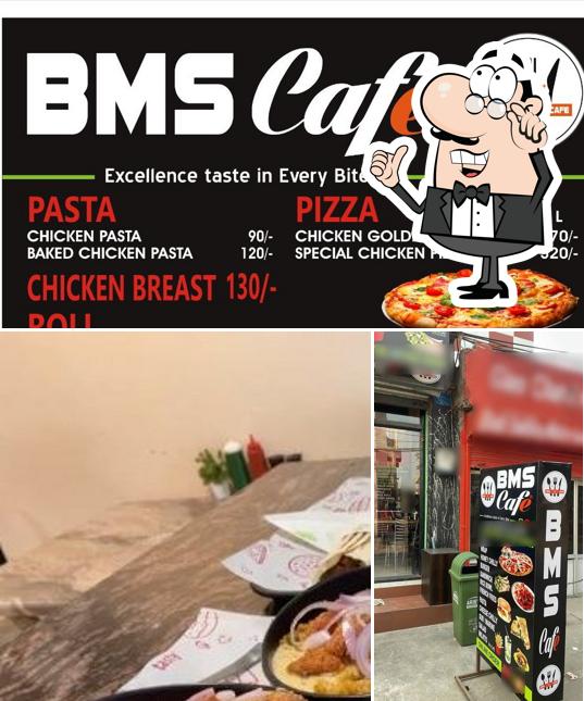 Take a look at the picture showing interior and food at BMS CAFe