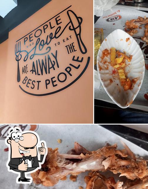 Look at the picture of Rooster Fast Food