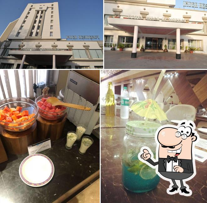 This is the picture showing exterior and drink at Khana Khazana