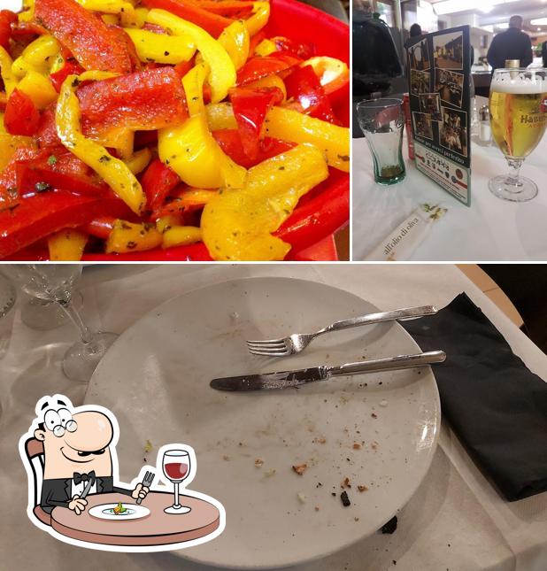 Tra le diverse cose da Pizzeria Corrado si possono trovare la cibo e birra