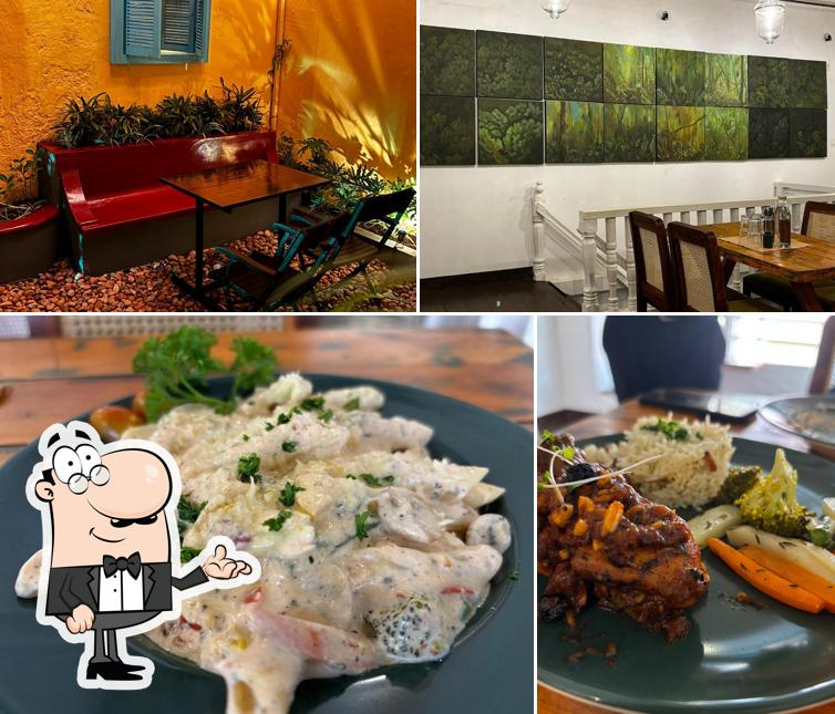 Check out the picture showing interior and food at Cafe Tamara