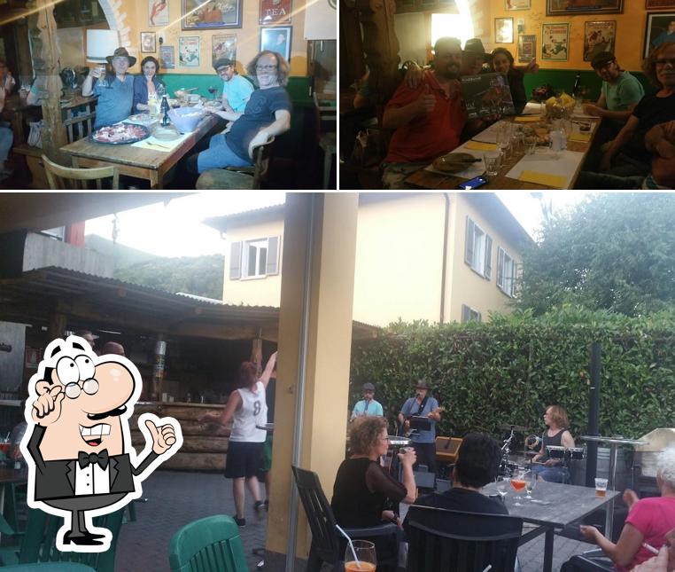 Siediti a un tavolo di Irish Pub Club Alpino