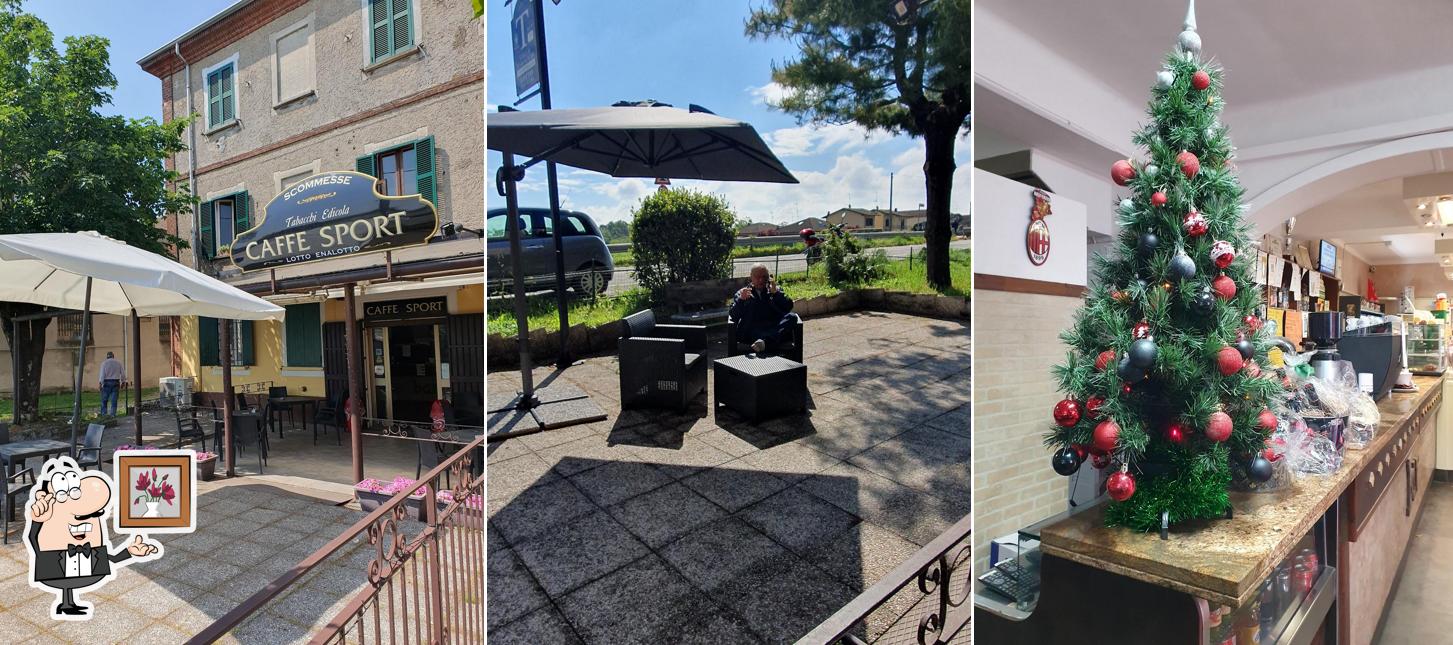 Siediti a un tavolo di Caffè Sport