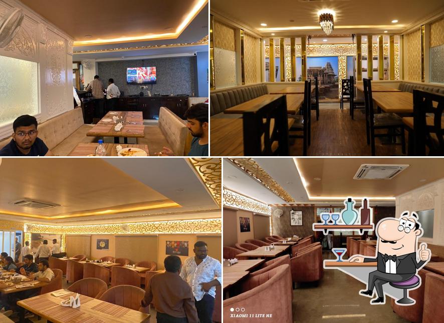 Take a seat at one of the tables at Nava Ruchulu by Hyderabad Spice