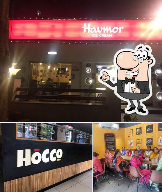 Take a seat at one of the tables at Hocco Eatery- Anandnagar