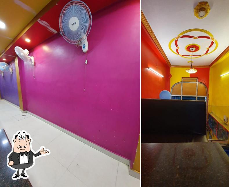 Take a seat at one of the tables at Manpasand Family Restaurant