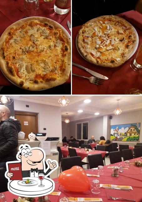 Questa è la foto che mostra la cibo e tavolo da pranzo di Trattoria degli Amici