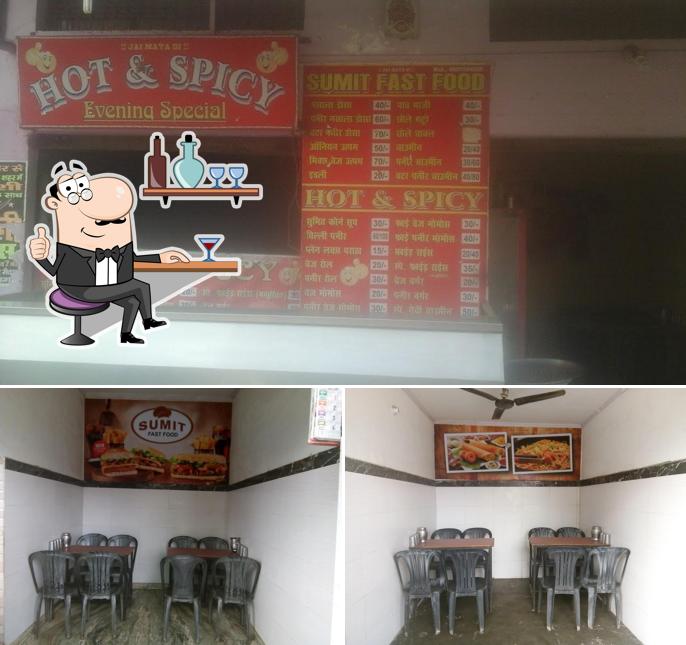 Among different things one can find interior and food at Sumit Fast Food