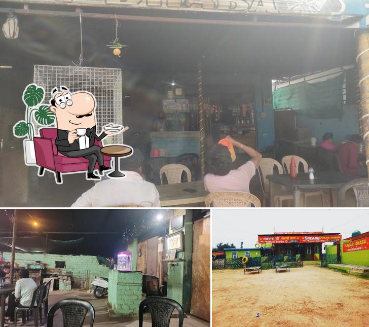 Take a seat at one of the tables at Sardar Ji Punjabi Family Dhaba