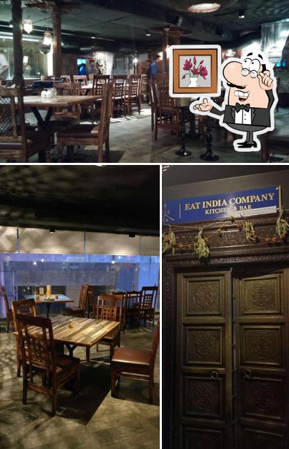 Take a seat at one of the tables at Eat India Company