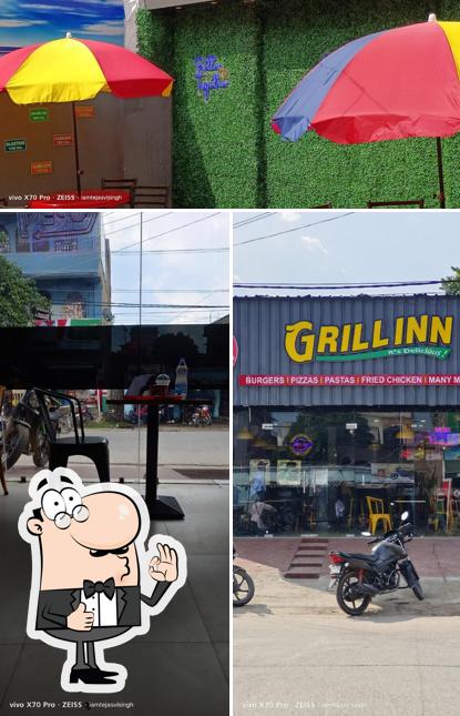 Look at the photo of Grill Inn
